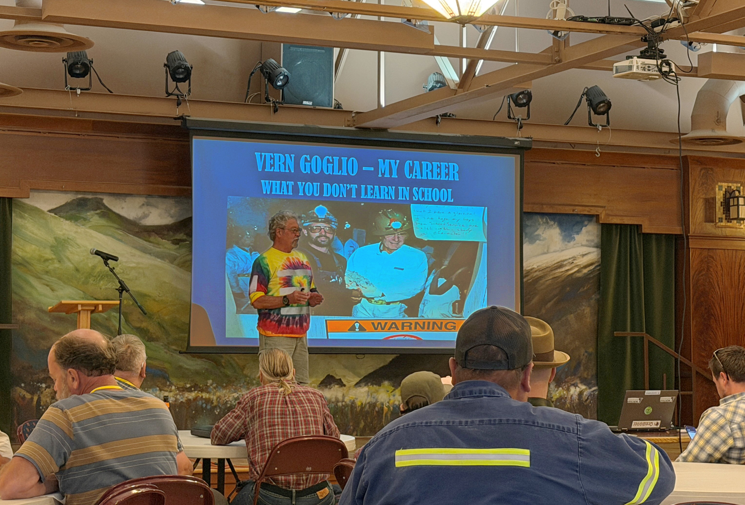Elko SME 3_AW Man standing on stage presenting to crowd